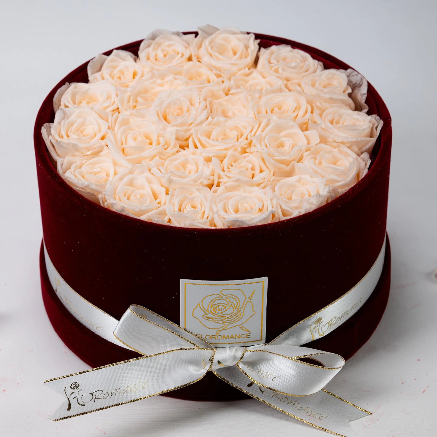 Floromance | Bespoke Champagne Roses | Medium Round Burgundy Gift Box