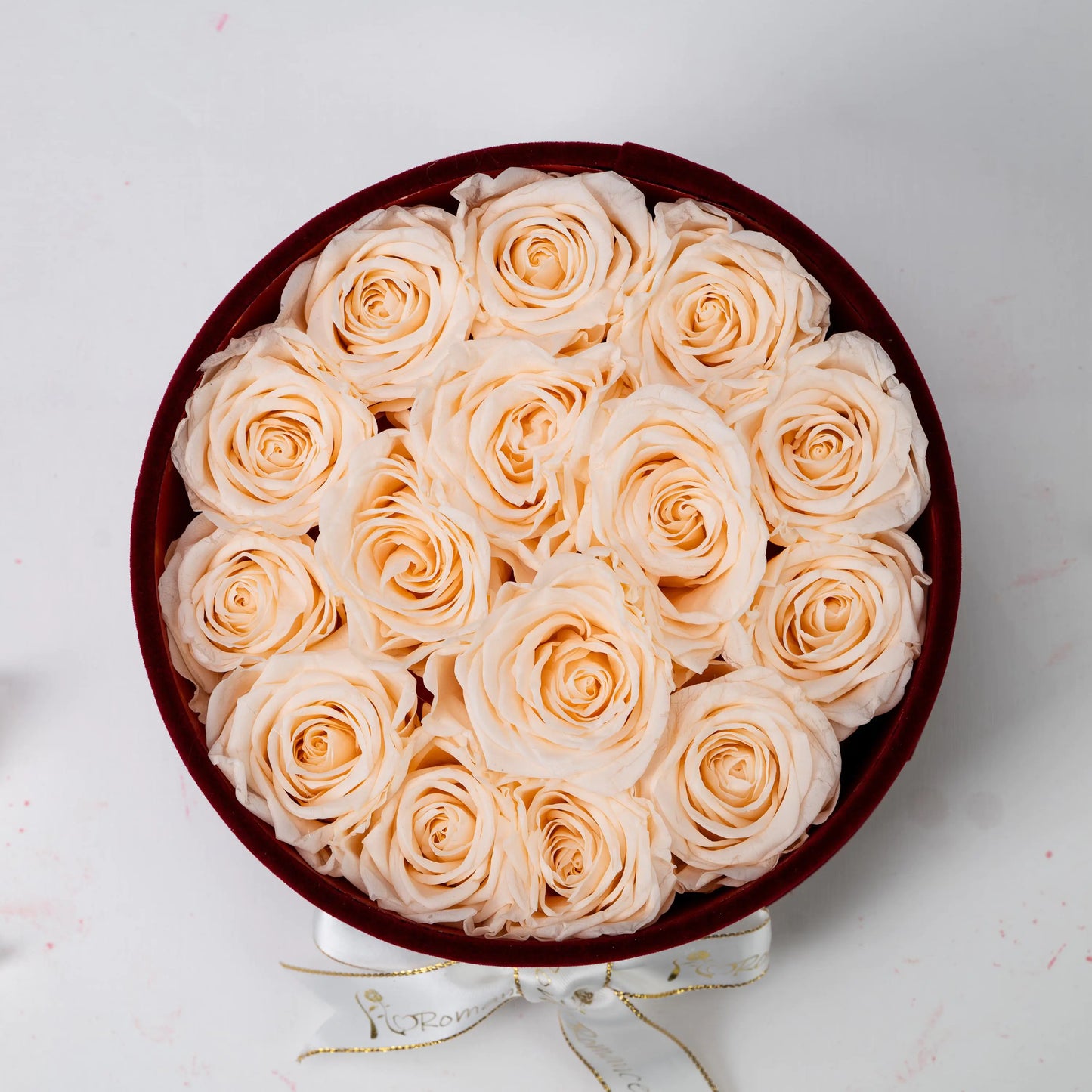 Floromance Bespoke Champagne Roses in Small Round Burgundy Gift Box