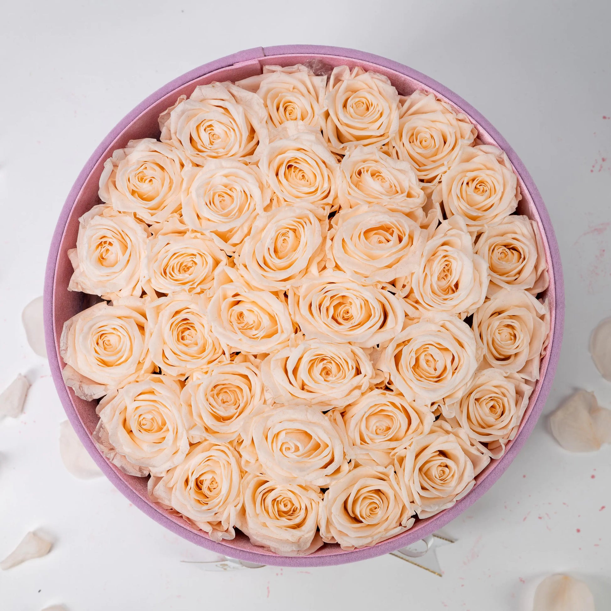 Bespoke Champagne Roses in Large Round Pink Gift​ Box